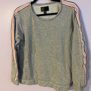 Medium crewneck sweatshirt with pink racer stripe, worn in but good condition